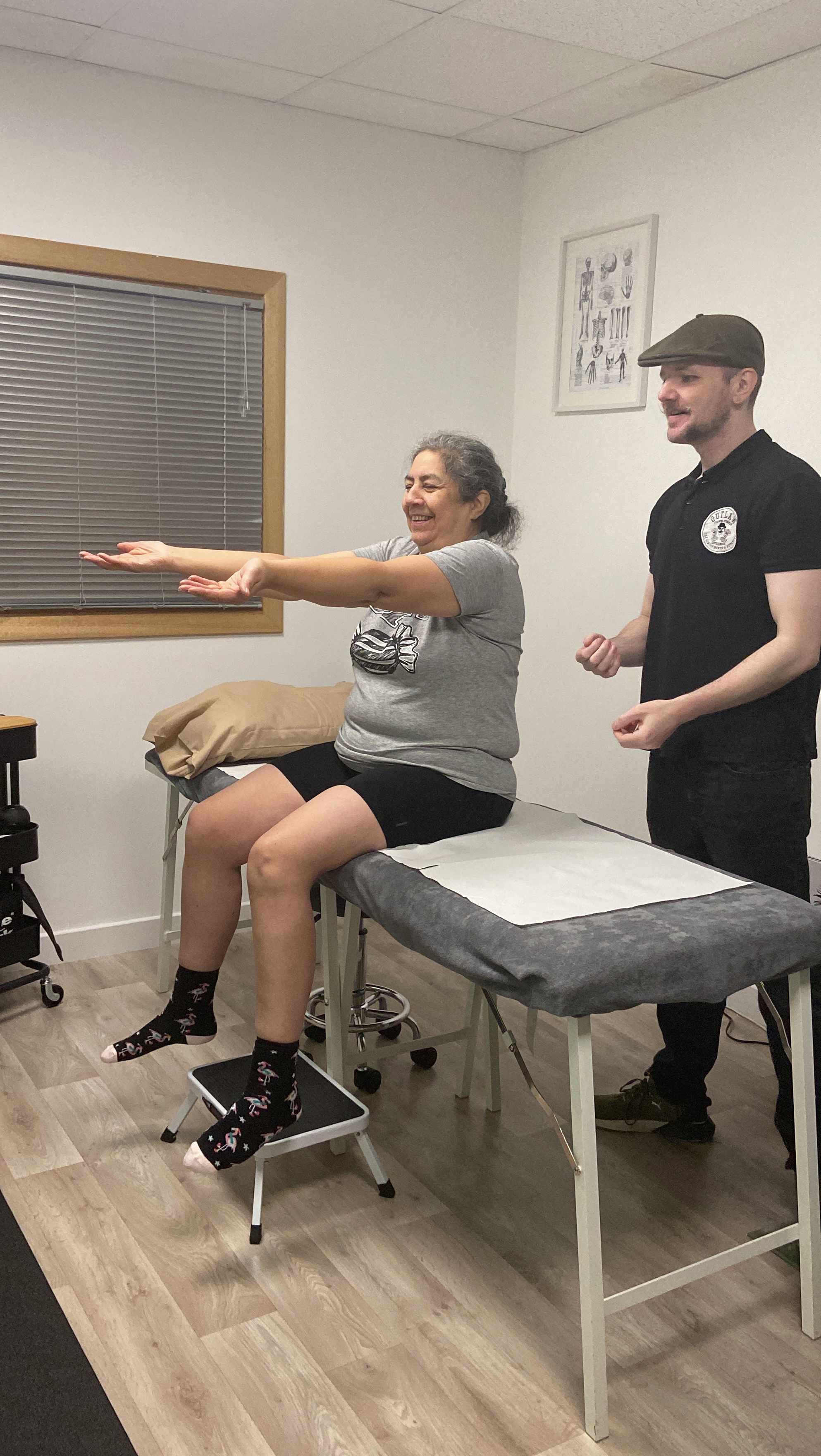 Masters Female Powerlifter Going Through Sports Therapy Assessments